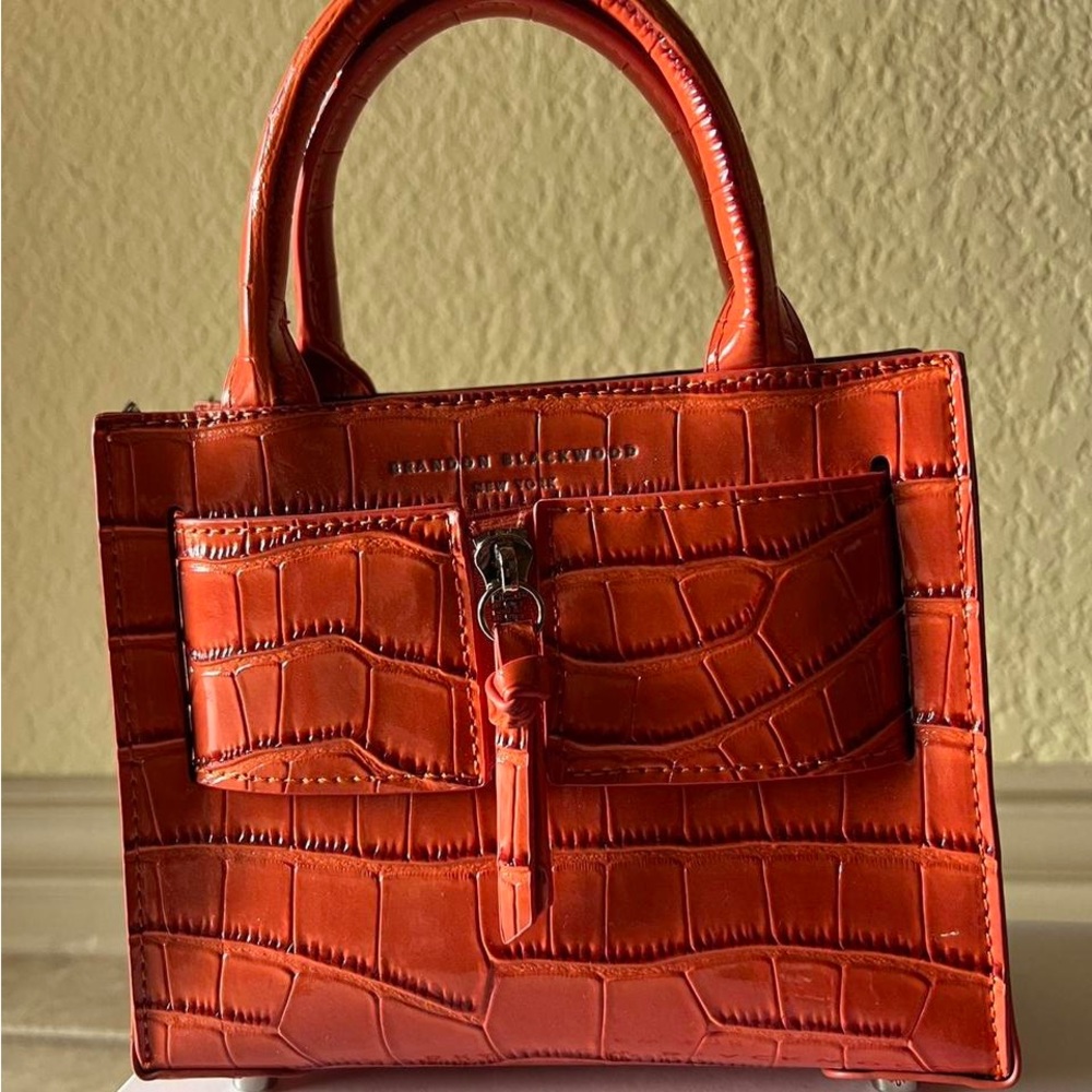 Brandon Blackwood orange Kuei bag